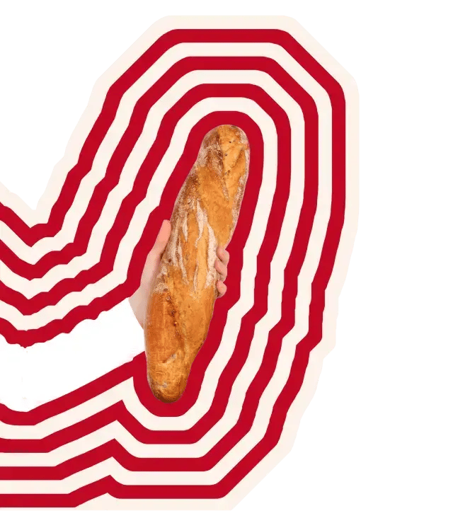 Image d'une main qui tient une baguette 